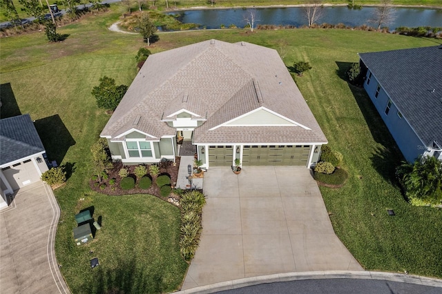 drone / aerial view featuring a water view