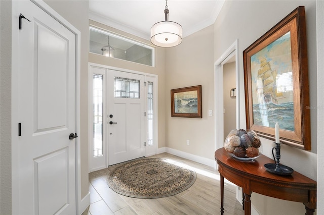 2124 Biller Cir, The Villages, FL 32163 - foyer entrance with baseboards, crown molding, and light wood finished floors