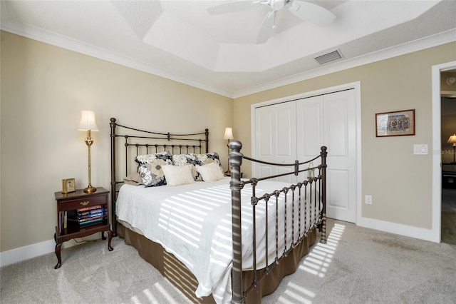 2124 Biller Cir, The Villages, FL 32163 - bedroom featuring a closet, baseboards, visible vents, and carpet flooring