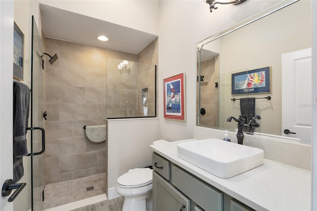 2124 Biller Cir, The Villages, FL 32163 - full bathroom with a stall shower, vanity, and toilet