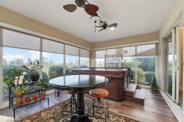 2124 Biller Cir, The Villages, FL 32163 - sunroom / solarium with plenty of natural light and a ceiling fan