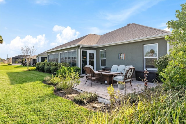 2124 Biller Cir, The Villages, FL 32163 - back of house featuring a fire pit, a patio, a yard, and roof with shingles