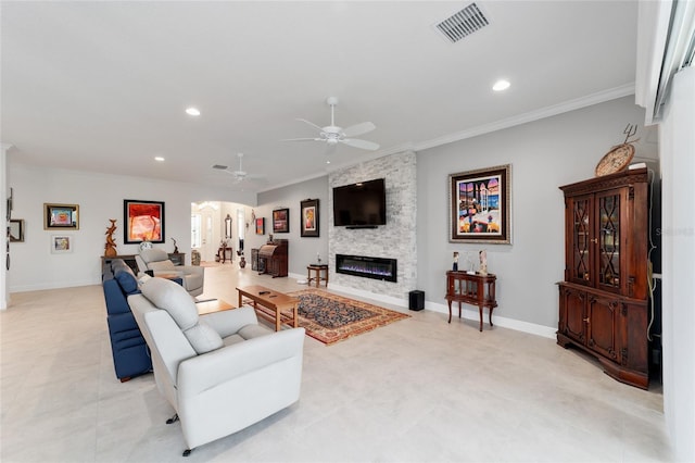 living room featuring visible vents, baseboards, a stone fireplace, and crown molding