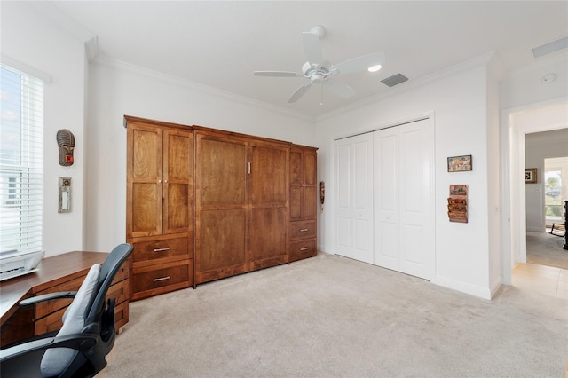 home office featuring visible vents, light colored carpet, and ornamental molding