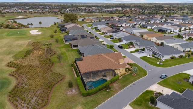 birds eye view of property featuring a residential view, golf course view, and a water view