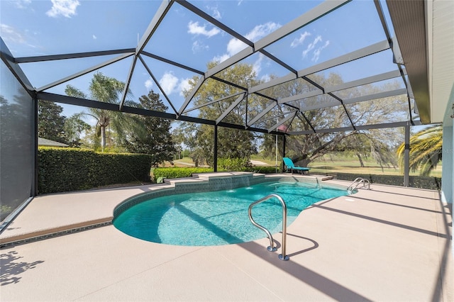 outdoor pool with a lanai and a patio