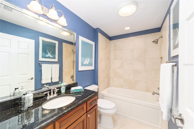 bathroom featuring  shower combination, vanity, toilet, and tile patterned floors