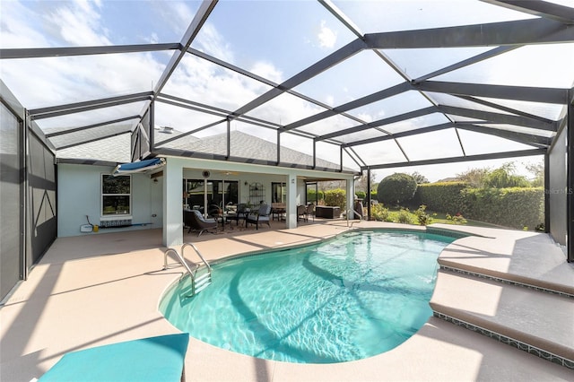 outdoor pool with an outdoor living space and a patio