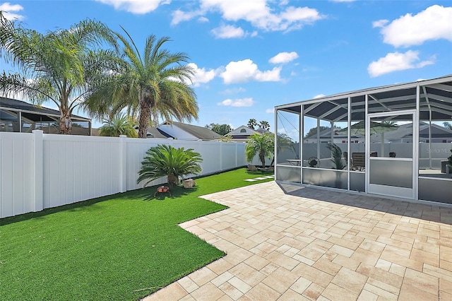 view of yard with a patio area and a fenced backyard