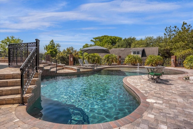 outdoor pool with a patio