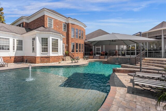 pool with a patio