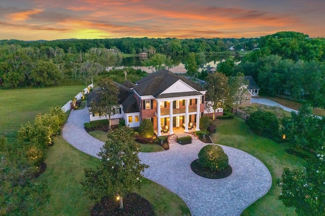 aerial view with a wooded view