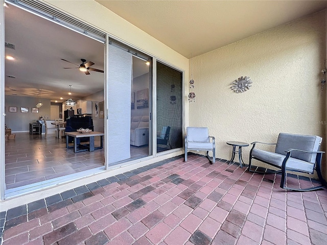 view of patio / terrace featuring visible vents