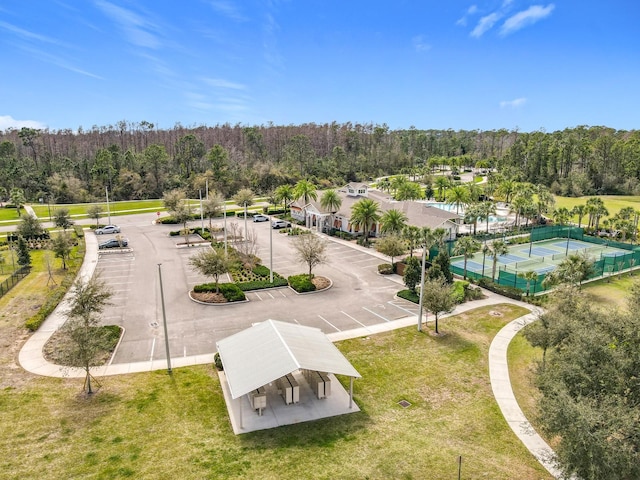 bird's eye view featuring a wooded view