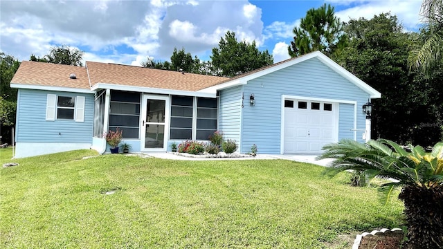 ranch-style house with a garage, a front yard, a sunroom, and roof with shingles