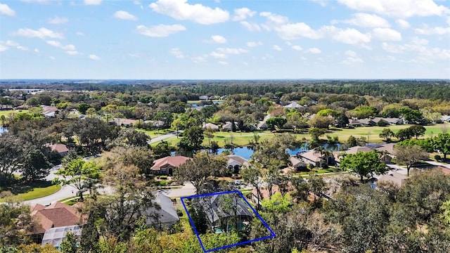 bird's eye view featuring a water view and a residential view