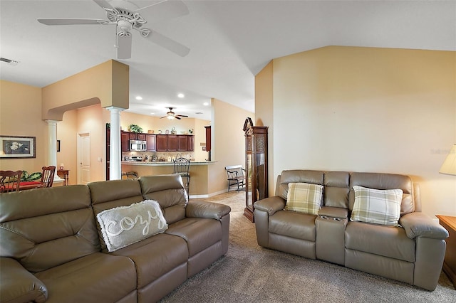 living room featuring light colored carpet, lofted ceiling, ceiling fan, ornate columns, and recessed lighting