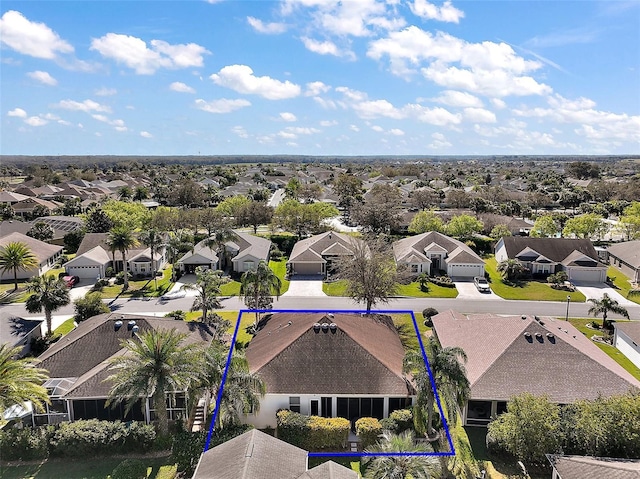 drone / aerial view with a residential view