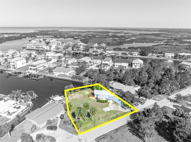 aerial view featuring a water view and a residential view