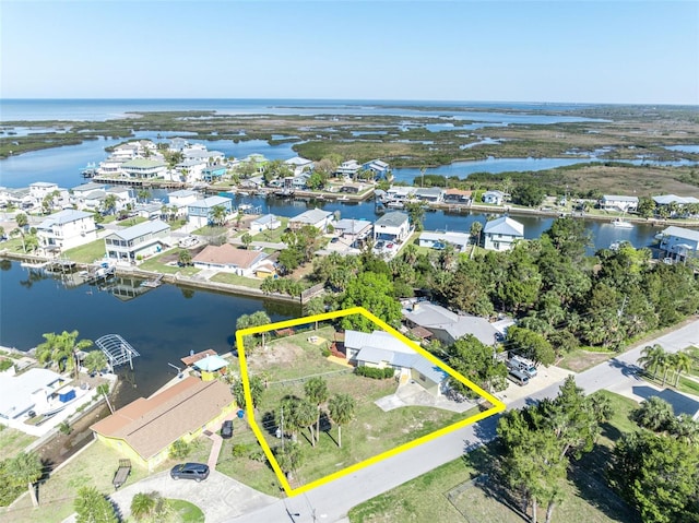 aerial view with a water view and a residential view