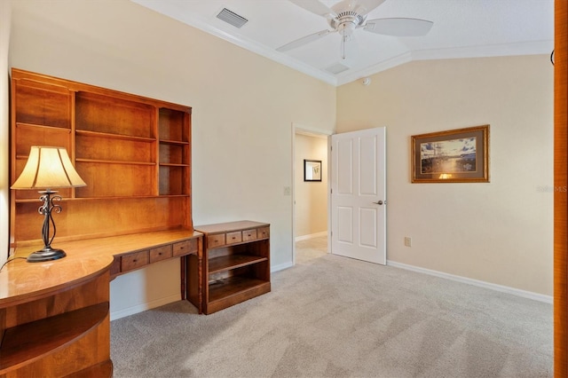 office featuring light carpet, visible vents, baseboards, vaulted ceiling, and crown molding