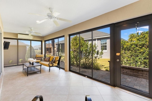 sunroom with ceiling fan and a wall mounted AC