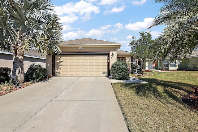 view of front of home with a garage, a front lawn, concrete driveway, and stucco siding