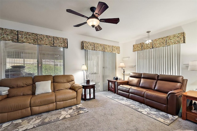 living room featuring ceiling fan and carpet flooring