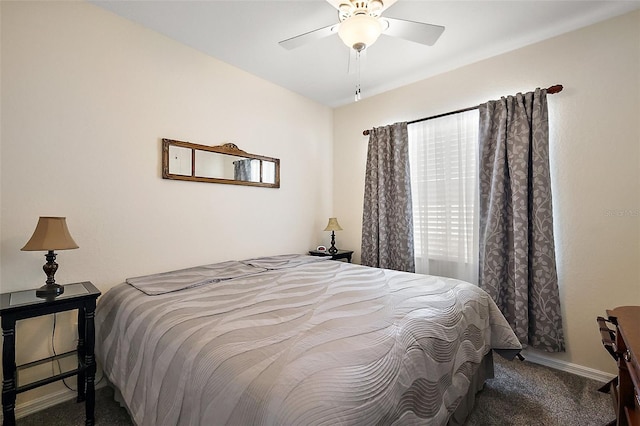 bedroom featuring carpet floors, baseboards, and a ceiling fan