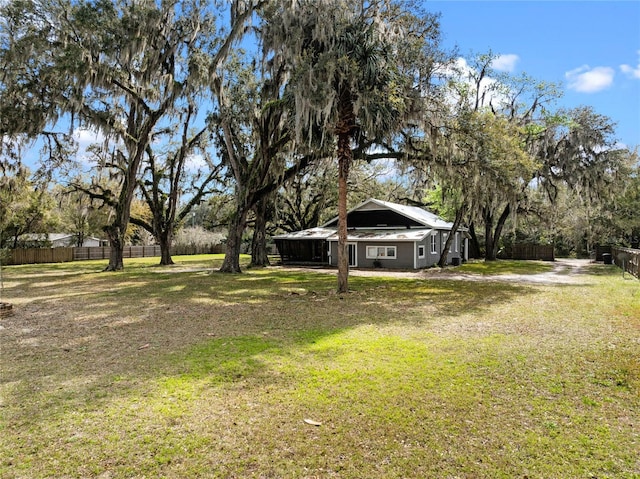 view of yard with fence