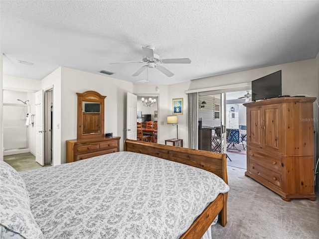 bedroom featuring a textured ceiling, light carpet, ceiling fan with notable chandelier, visible vents, and access to outside