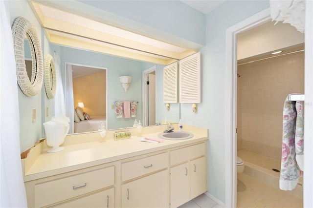 bathroom featuring tile patterned floors, a shower stall, toilet, and vanity