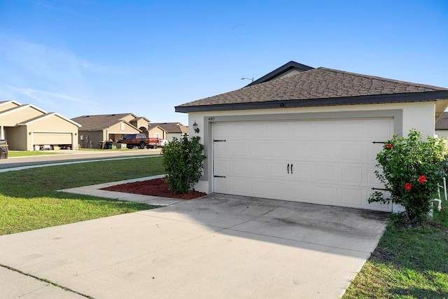 exterior space featuring a yard, a shingled roof, a residential view, and stucco siding