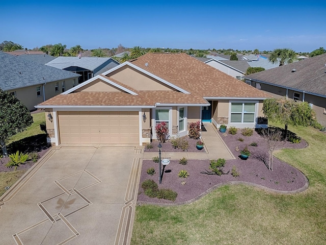 single story home with concrete driveway, roof with shingles, an attached garage, a front lawn, and stucco siding