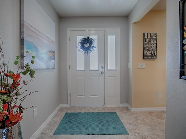 foyer with baseboards