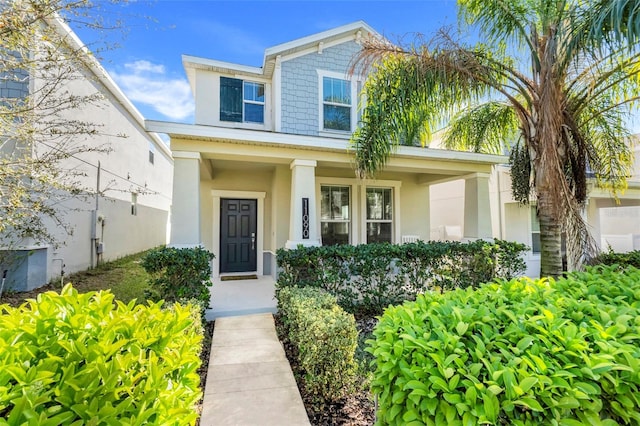 doorway to property with stucco siding