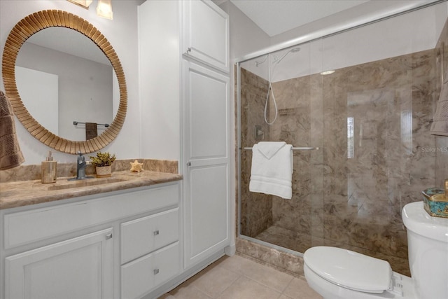 full bath with tile patterned flooring, vanity, toilet, and a shower stall