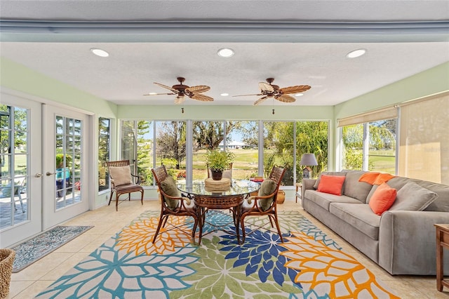 sunroom featuring french doors