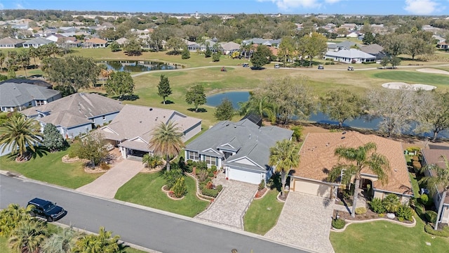 bird's eye view with a residential view, a water view, and golf course view