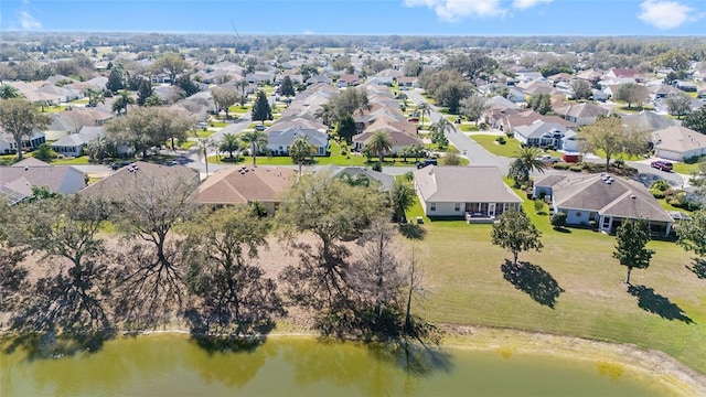 aerial view with a water view and a residential view