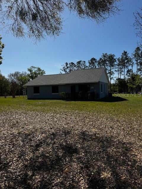 view of front of property with a front yard