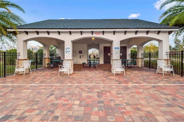 view of patio / terrace featuring fence