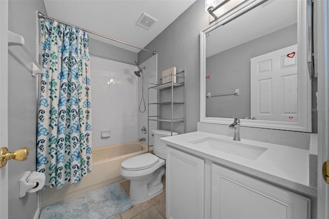 bathroom featuring vanity, visible vents, shower / bath combo, tile patterned floors, and toilet