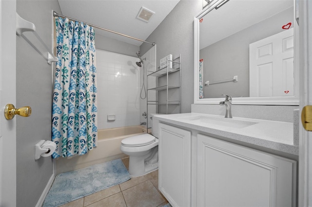 full bath featuring vanity, visible vents, shower / bath combo, tile patterned floors, and toilet