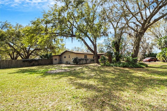 view of yard with fence