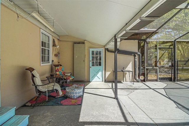 view of patio / terrace with a lanai