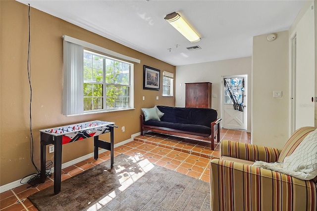 interior space featuring visible vents and baseboards