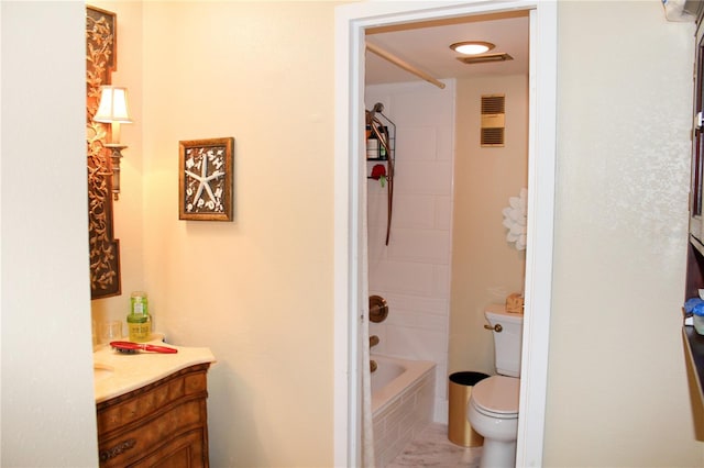 full bath featuring visible vents, vanity, toilet, and bathing tub / shower combination