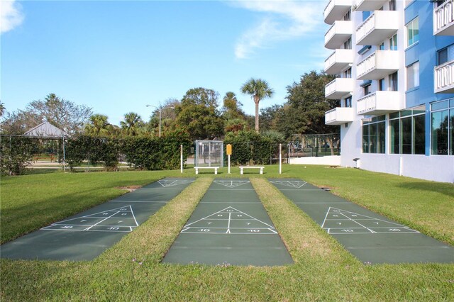 view of home's community featuring a yard