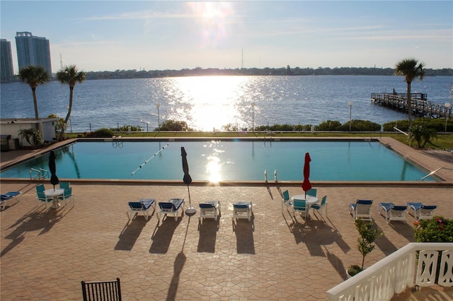 view of pool with a water view